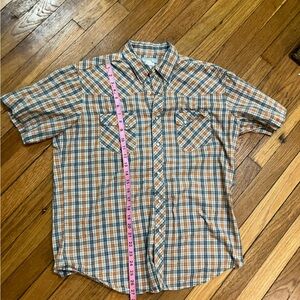 Soft broken-in Wrangler short sleeve pearl snap shirt